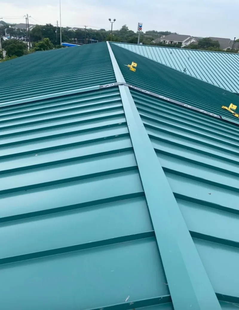 Green commercial metal roof ridge and valley for Metal Roof Repair in Silver Lake